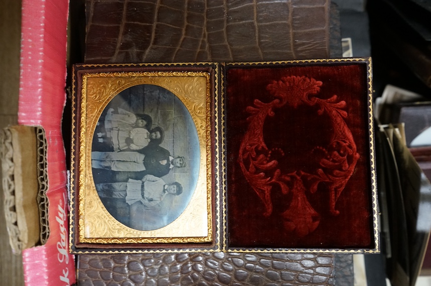 A collection of albums of early to mid 20th century photos, including small group of Daguerreotype and Ambrotypes, a carte postal of King Edward VIII with topographical carte postal, a Beagles postcard of a Blazing Airsh